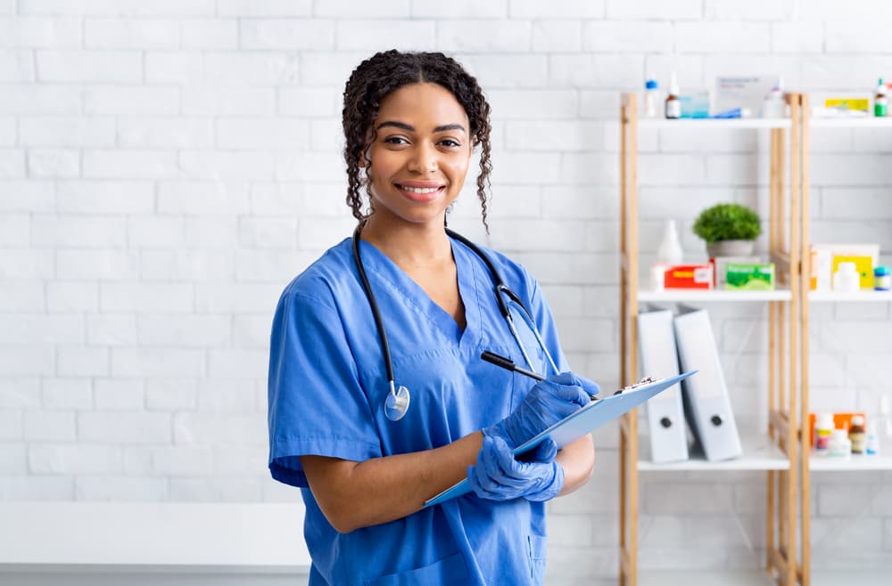 woman veterinarian looking at camera