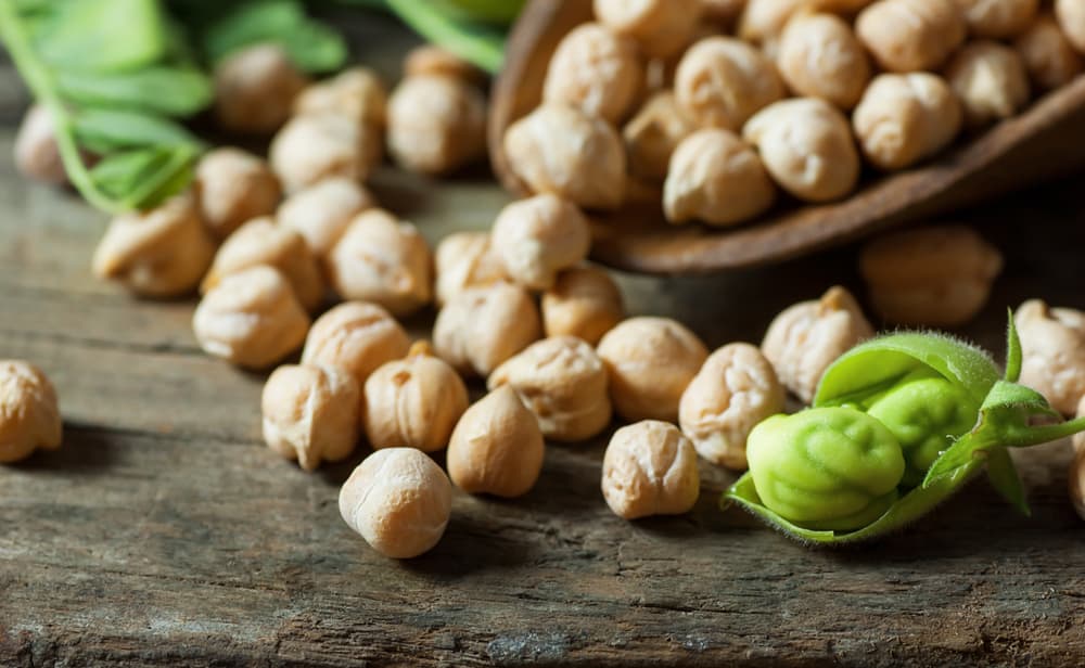 Chickpeas spilling out of bowl