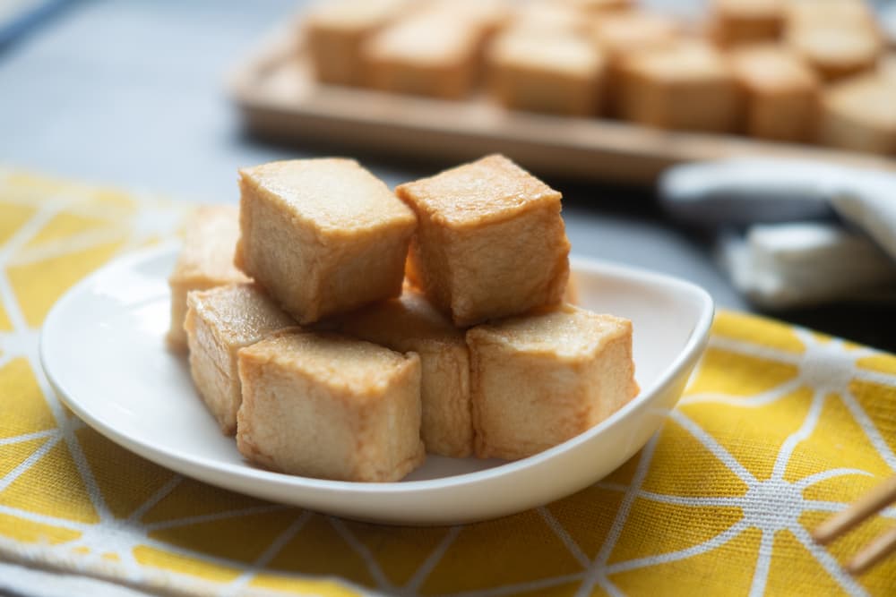 Cooked tofu in a bowl on the table