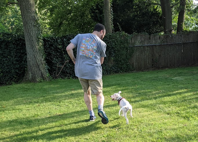 Jazzy running with foster dad