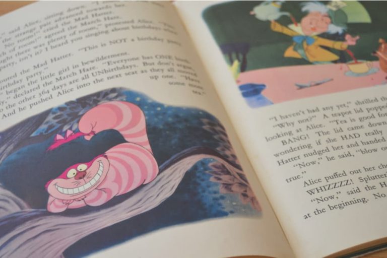 Cheshire Cat grinning from book page